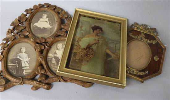 A Bavarian carved wood triptych photograph frame, 21cm, a chrystoleum and a gilt metal mounted photo frame 14cm